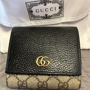 Gucci Black and Gold Wallet